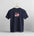 Navy blue t-shirt with USA flag design on a hanger against a light gray background