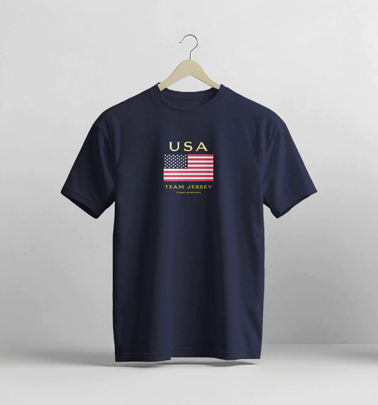 Navy blue t-shirt with USA flag design on a hanger against a light gray background