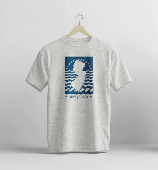 Gray t-shirt with New Jersey graphic on a hanger against a light gray background