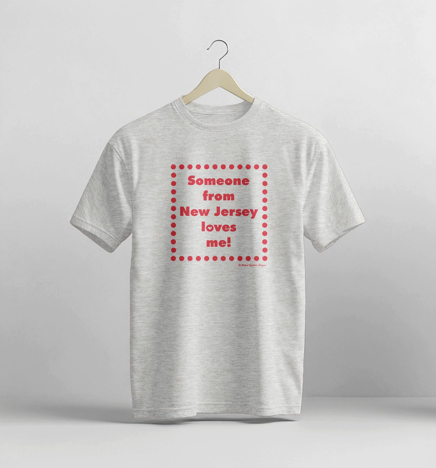 Gray t-shirt with red text on a white background