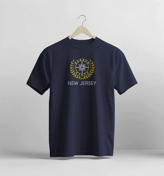 Navy blue t-shirt with 'New Jersey' design on a hanger against a light gray background