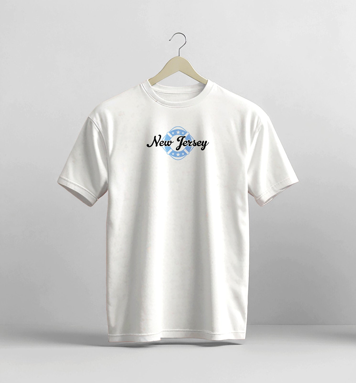 White t-shirt with 'New Jersey' text on a hanger against a gray background