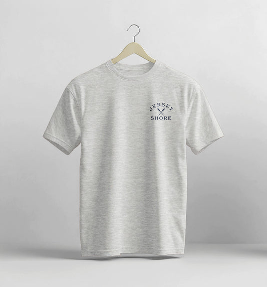 Gray t-shirt with 'Jersey Shore' text on a hanger against a light gray background