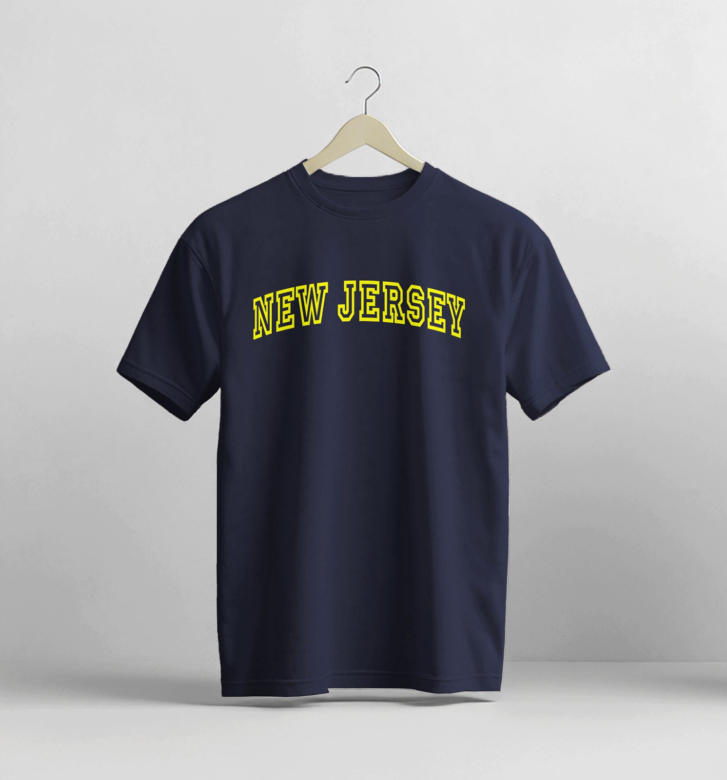 Navy blue t-shirt with 'NEW JERSEY' printed in yellow on a white background