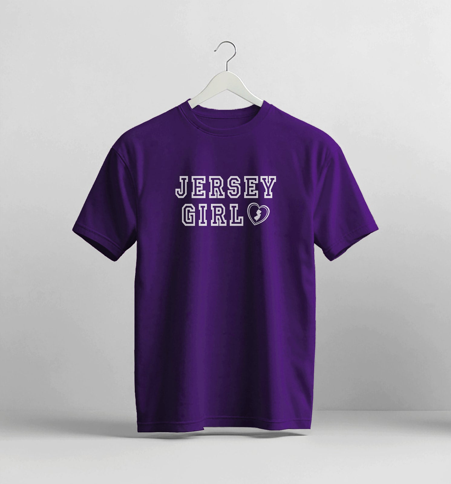 Purple t-shirt with 'Jersey Girl' text on a white background
