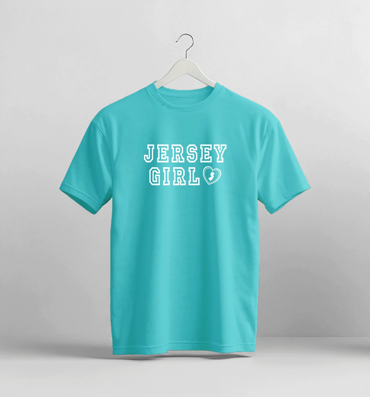 Turquoise t-shirt with 'Jersey Girl' text on a white background