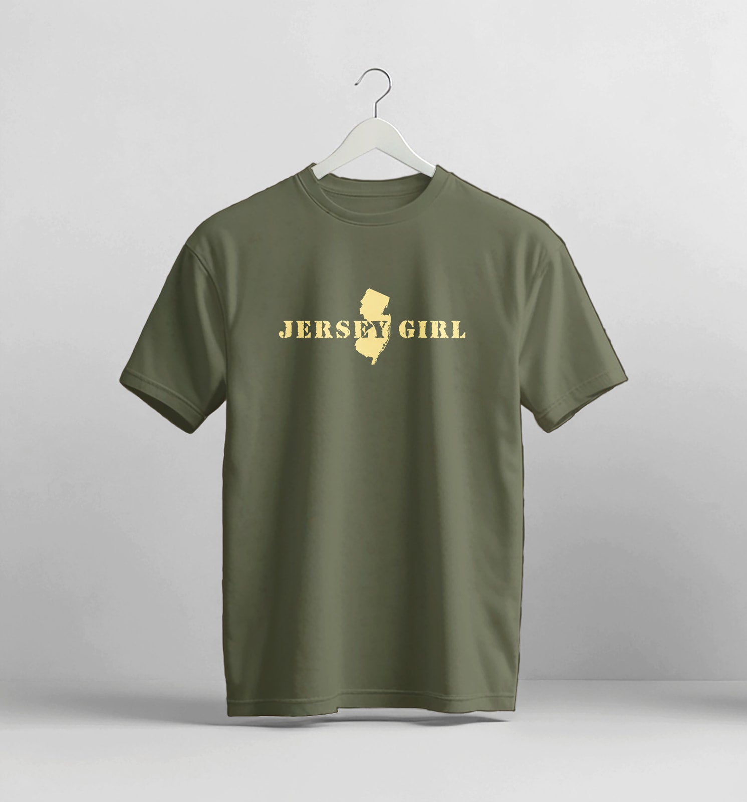 Green t-shirt with 'Jersey Girl' text and map graphic on a white background